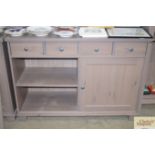 A painted sideboard fitted four drawers