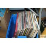 A box of various LP's