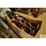 A box of various hand tools