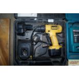 A Dewalt cordless drill in fitted case