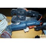 A Black & Decker orbital sander and a Titan detail