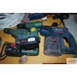 A Bosch cordless drill and two other Bosch cordles