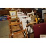 A spindle back dining chair together with two whit