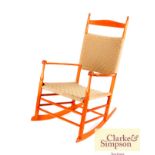 A Shaker Company rocking chair, having string seat