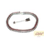 A costume necklace set red and white stones; and a