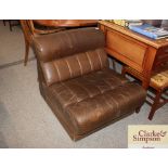 A retro leather upholstered chair