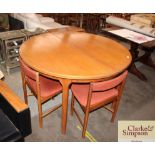 A circular G-plan extending dining table, 120cm di