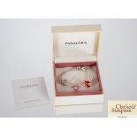 A Pandora bracelet in box with polishing cloth