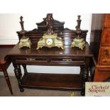 An early 20th Century oak serving table, having ra