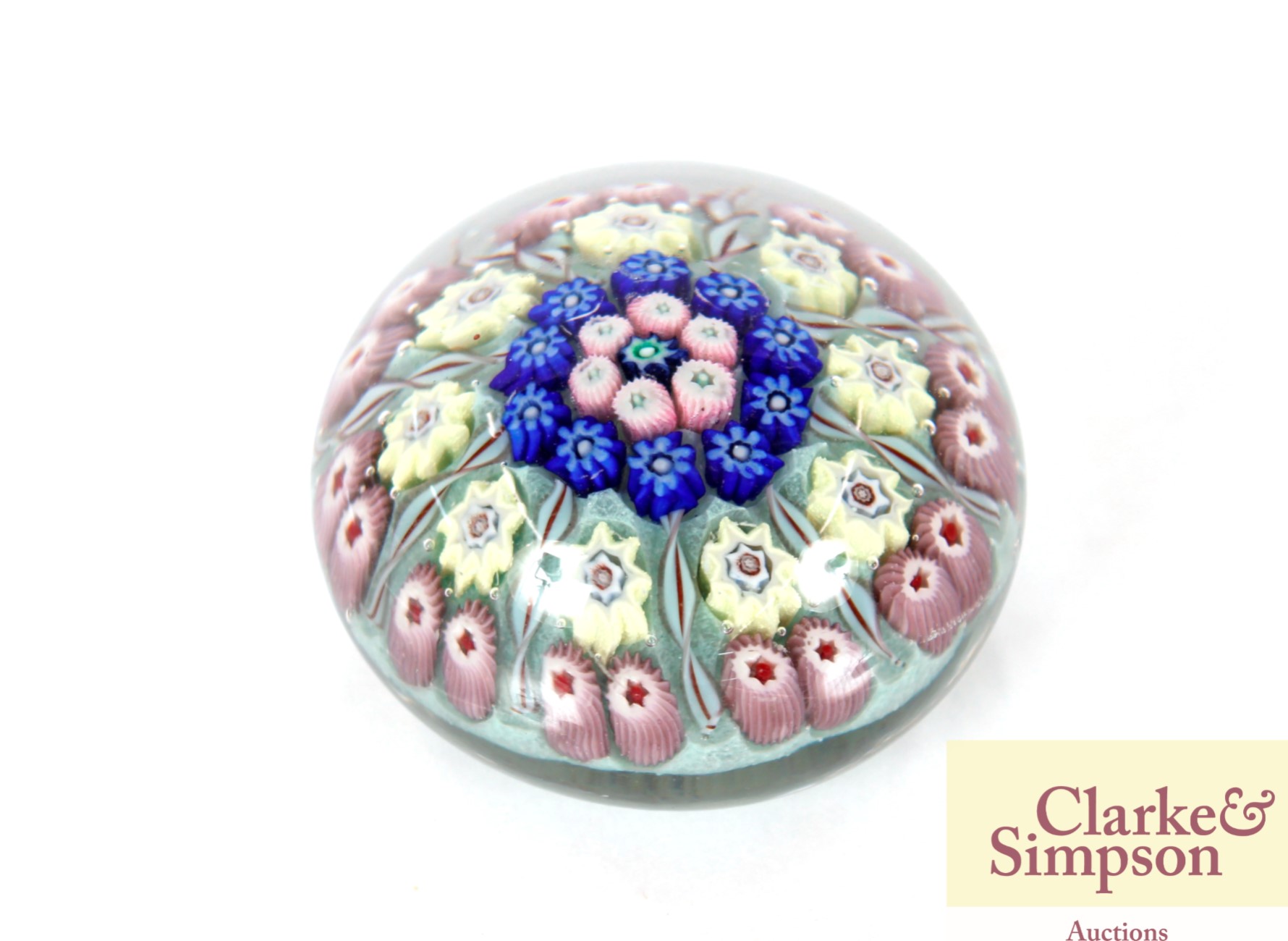 A Millefiori glass paperweight