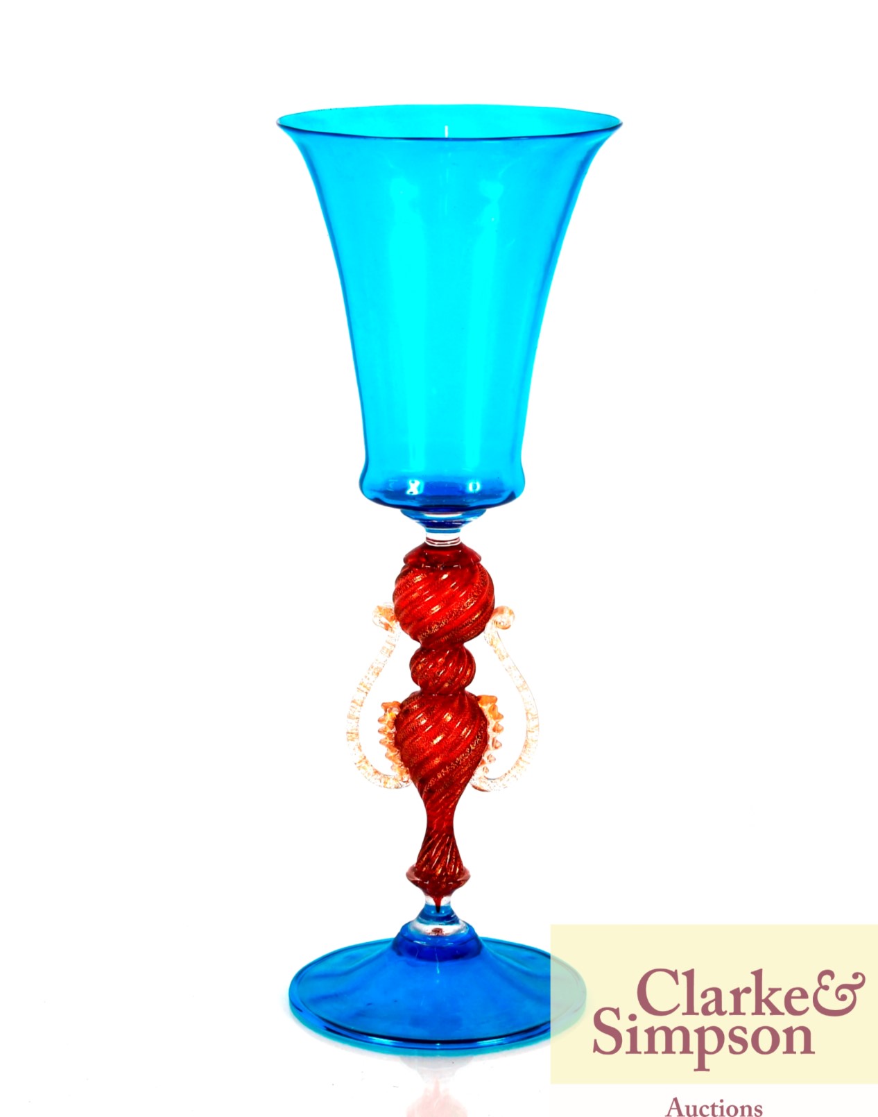 A Venetian blue glass goblet having a central ruby