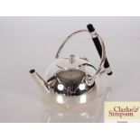 A small plated teapot in the manner of Dr. Christo