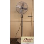 A Cinni chrome pedestal fan