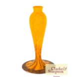 A French Art Glass lamp base having orange and green mo