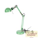 A green angle poise type lamp