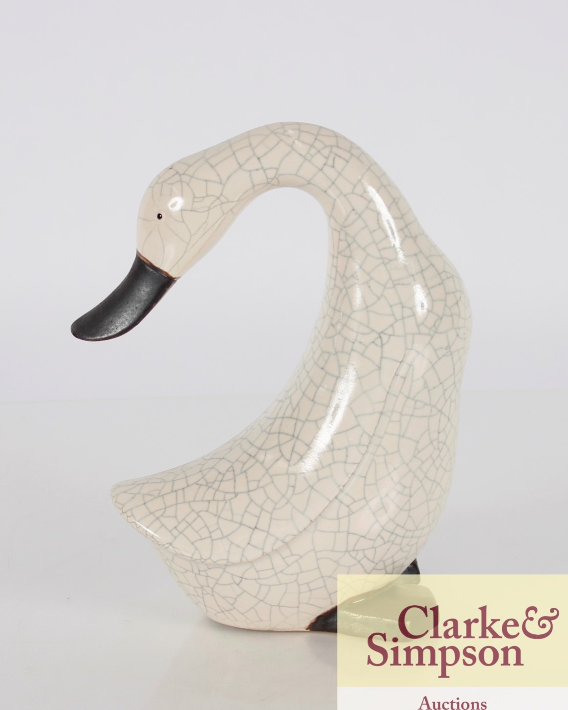 A Studio Pottery figure of a duck with crackle gla