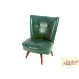 A green leather upholstered revolving nursing chai