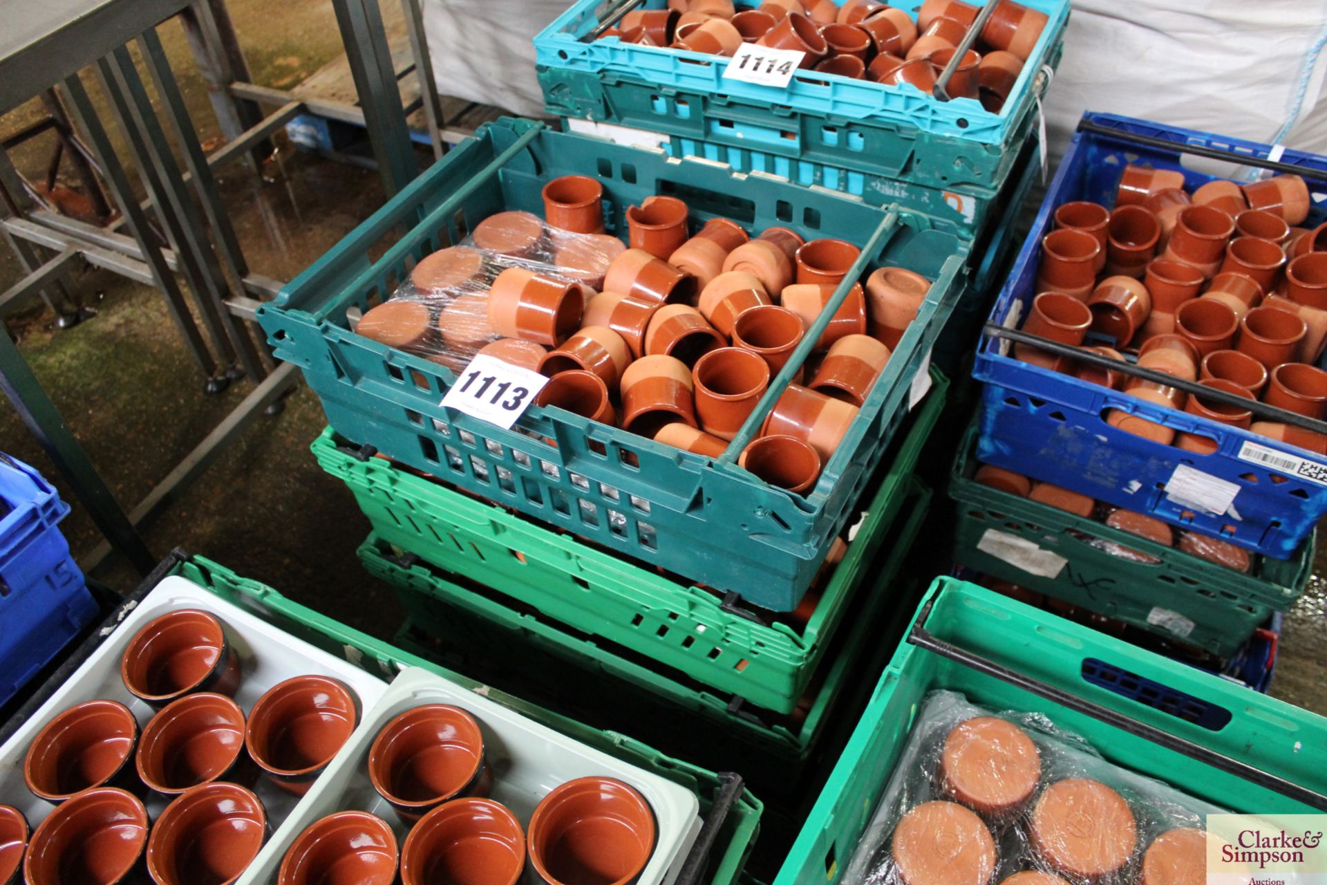 Four crates of modern terracotta ramekins/ pots. F