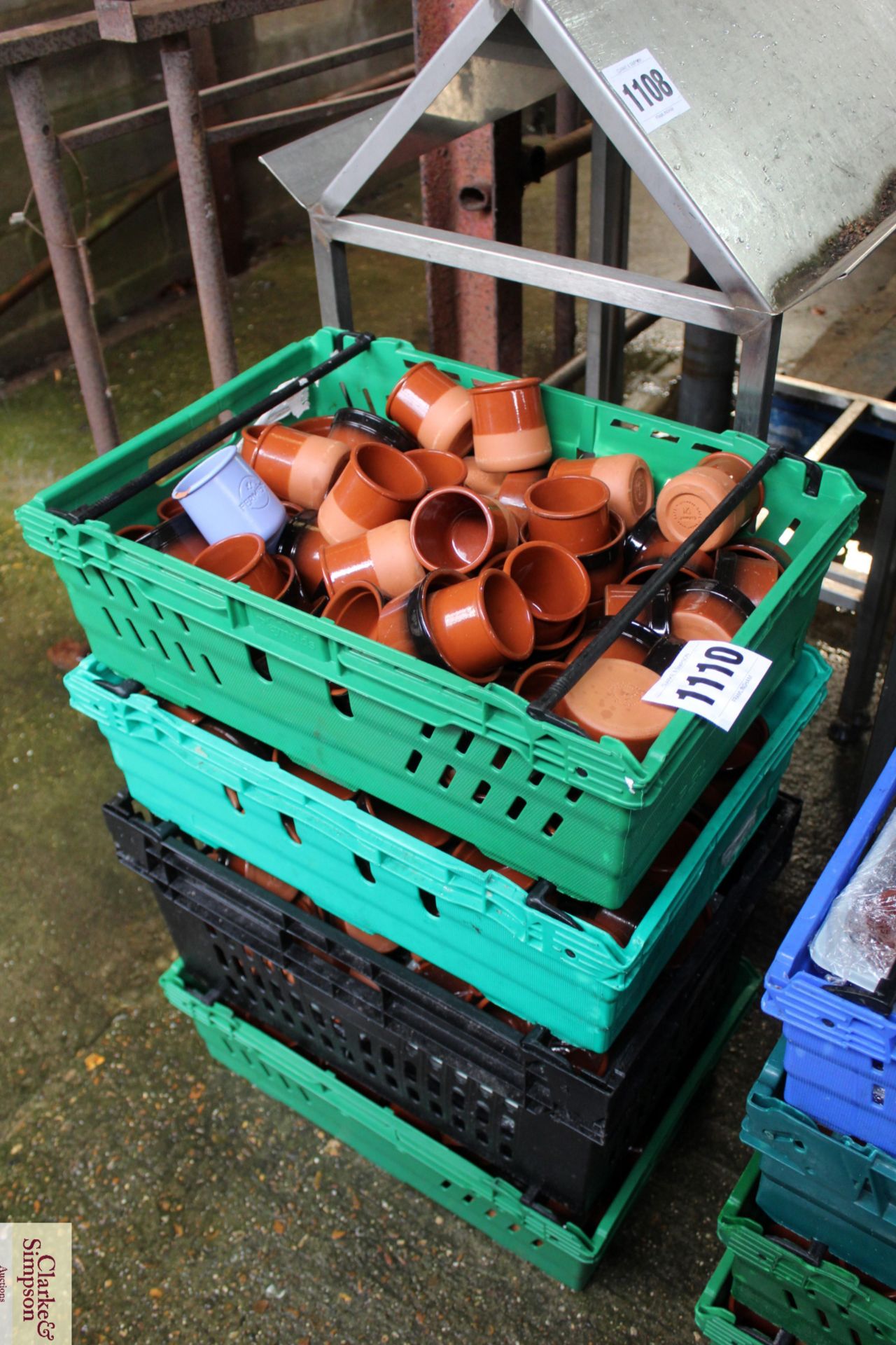 Four crates of modern terracotta ramekins/ pots. F