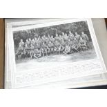 A folder of various photographic and military prin