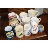 A quantity of various mugs to include Wedgwood dec