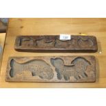 Two Asian wooden moulds