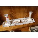 A Carlsbad porcelain part dressing table set with