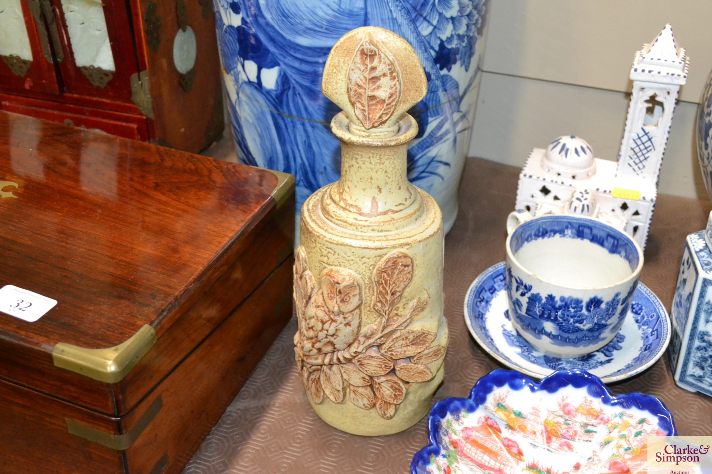 A Bernard Rooke pottery decanter with owl decorati