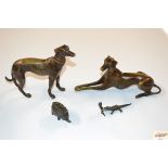 Two bronze models of greyhounds; a small crocodile
