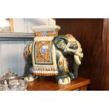 A pottery elephant jardinière stand