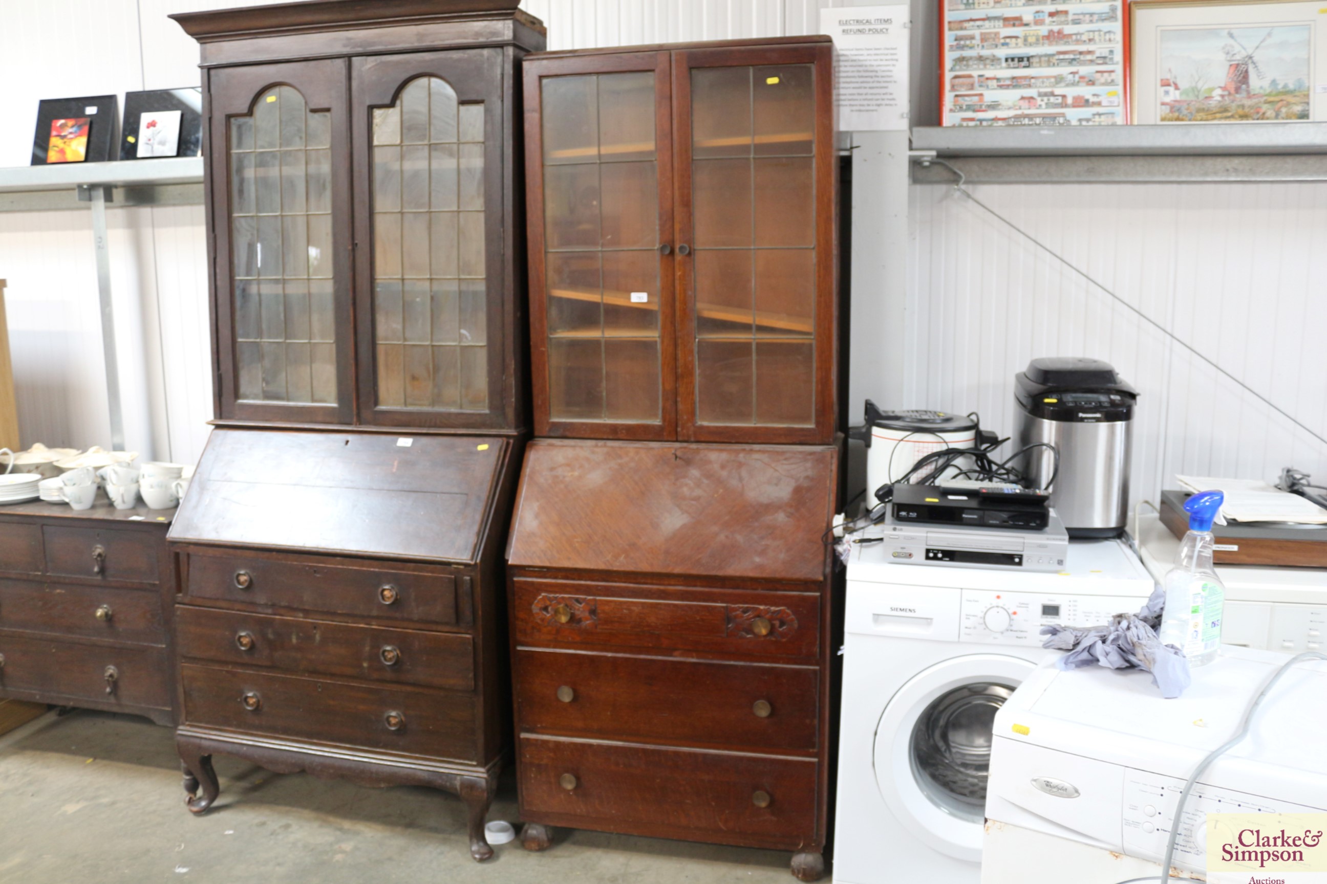 An oak bureau bookcase with leaded glazed doors