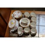 A Royal Albert "Tenderness" patterned part tea service