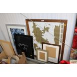 A world map together with two prints and various p