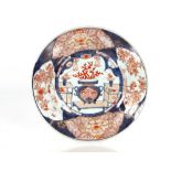 An Imari pattern tureen, the domed lid with gilt finial AF; and a Chinese saucer dish decorated