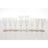 Eight 19th Century glass flutes