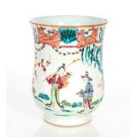 A 19th Century Chinese famille rose decorated baluster mug, 16cm high