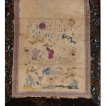 An antique Chinese silk embroidered panel, decorated foliage and symbols, 40cm x 36cm