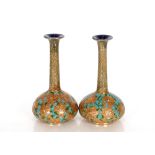 A pair of Royal Doulton Slaters Patent vases, elongated necks and baluster bodies heightened in