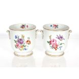 A pair of Dresden style floral decorated jardinières, 18cm dia. x 20cm high