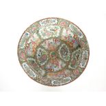 A large 19th Century Cantonese bowl decorated in the traditional manner, famille rose figures, birds