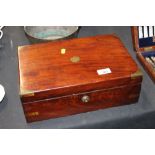 A 19th Century mahogany and brass writing box