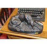 After P.J. Mene, a bronzed study of a hound
