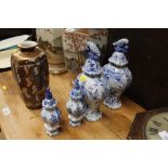 A pair of Delft style tin glazed vases and a small