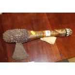 An African axe from Zaire with shell decoration