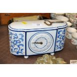 A Weimar / Lenzkirch blue and white china cased mantel timepiece