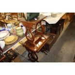 A nest of three mahogany occasional tables