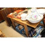 An oak Bowmans draw leaf dining table and six chai