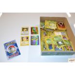 A box of Pokémon cards including Rule Book Version