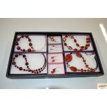 A tray of various hand made jewellery including co