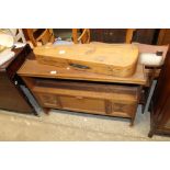 A hanging kitchen cabinet with wall shelf